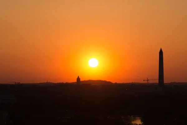 Tele-Zoom of the Sunrise with the Washington Monument as a Silhouette