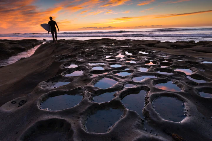 Surfer at the Tide Pools — California, USA